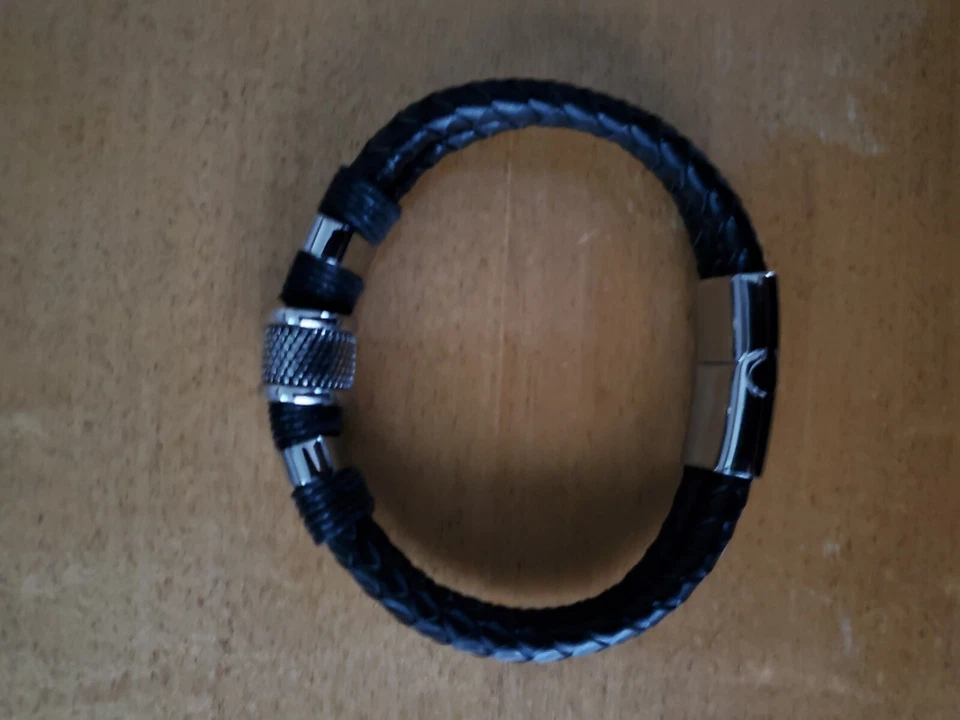 tejido trenzado cuero negro  Foto 2 de 2