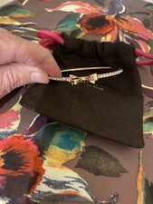 Kate Spade New York Rosegold Bow Bangle with Pouch