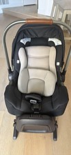 nuna revv rotating convertible car seat with foam inserts.