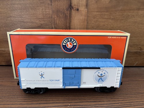 Lionel 6-29910 100 Aniversario Feria de Juguetes Boxcar Nuevo en Caja | Condition: New