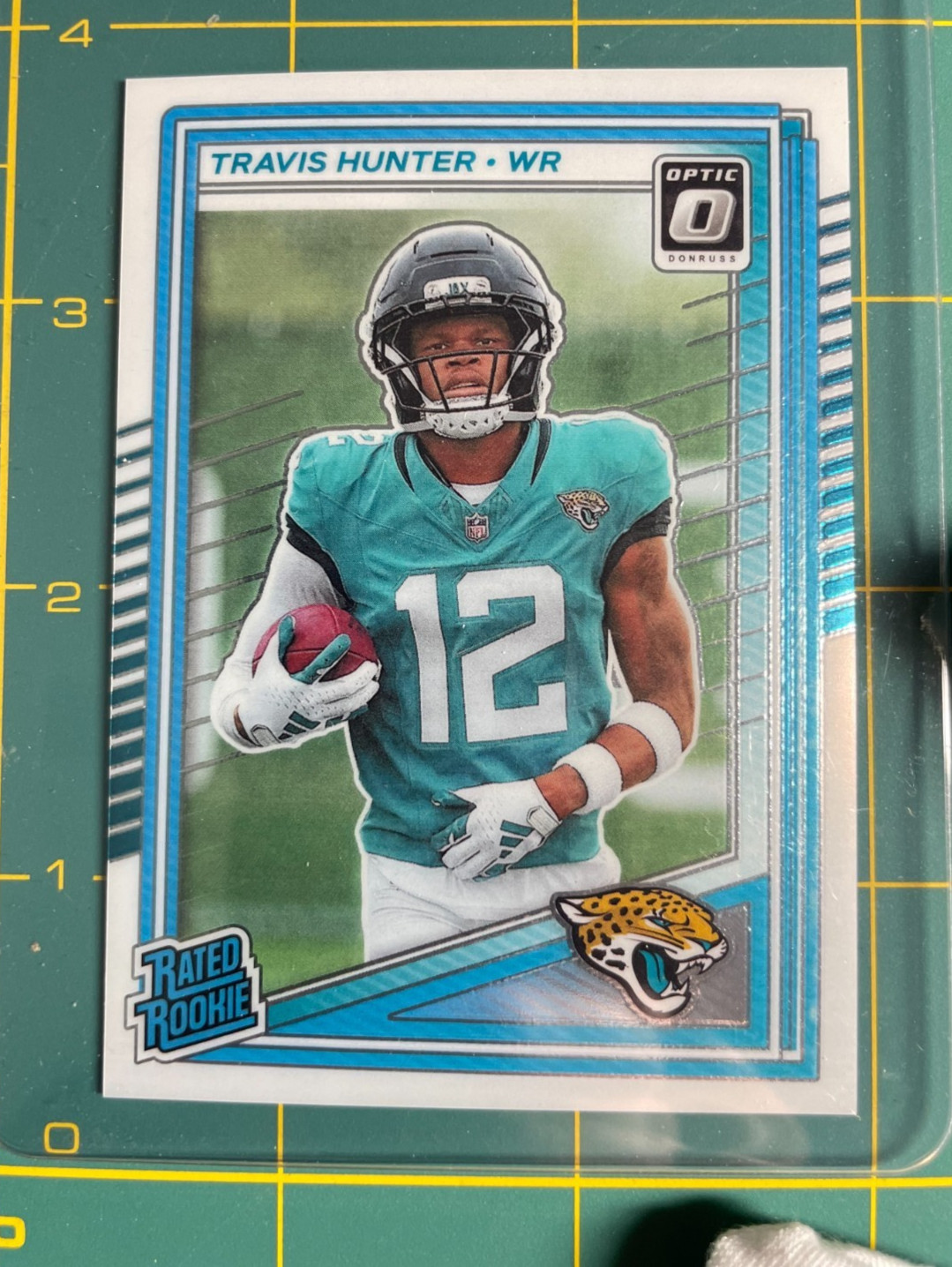 2025 Panini Donruss Optic - Rated Rookie Travis Hunter #201 Wave Prizm /300 (RC)