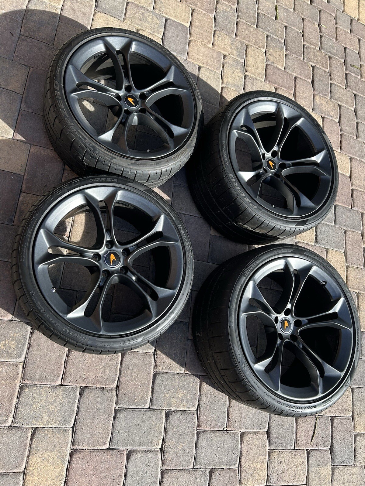 McLaren 720 new factory rims/tires   50 miles.   No chips or curbs ever.  