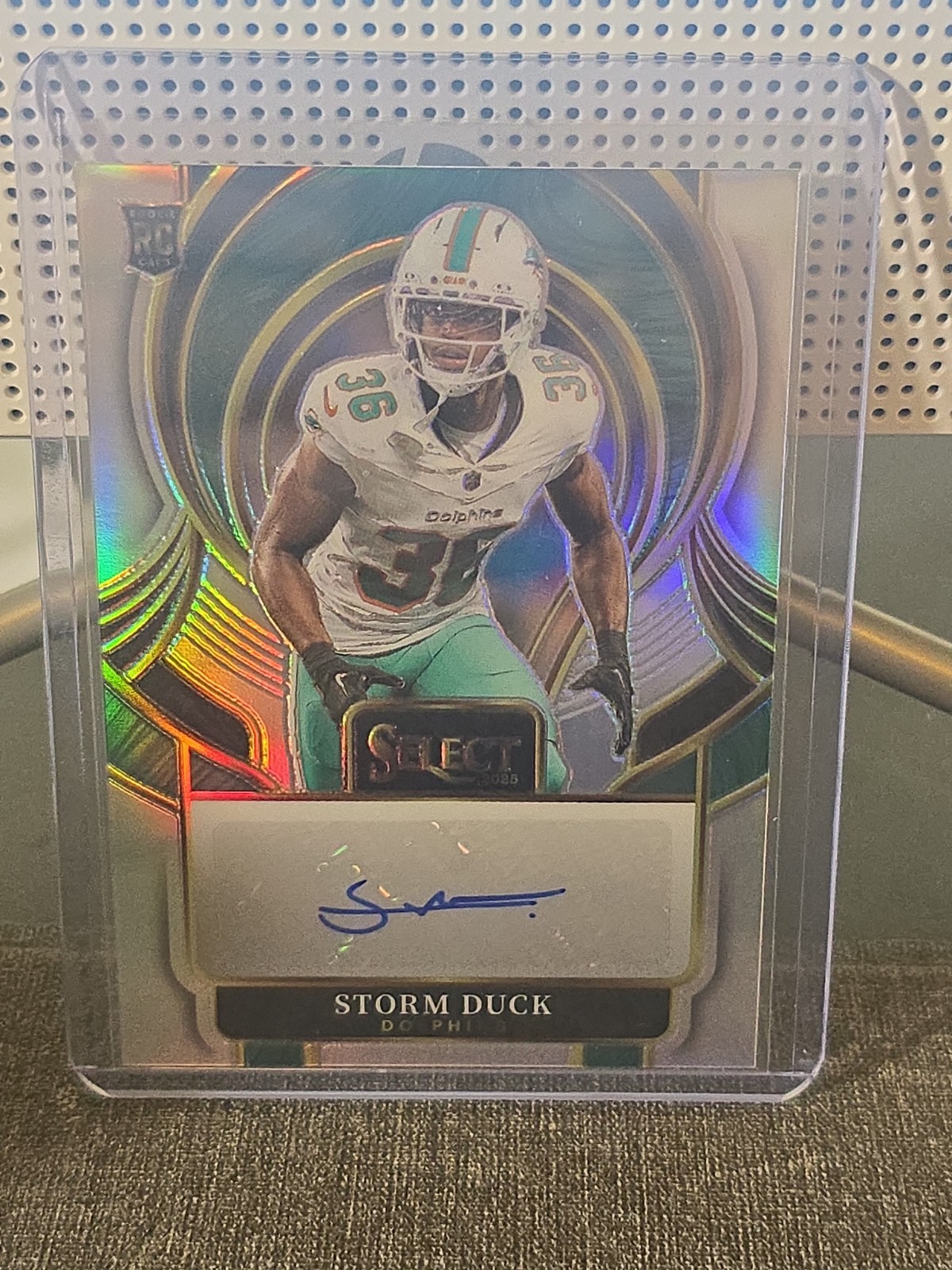 2025 Panini Select - Select Signatures Storm Duck #SIP-SDK (AU, RC)