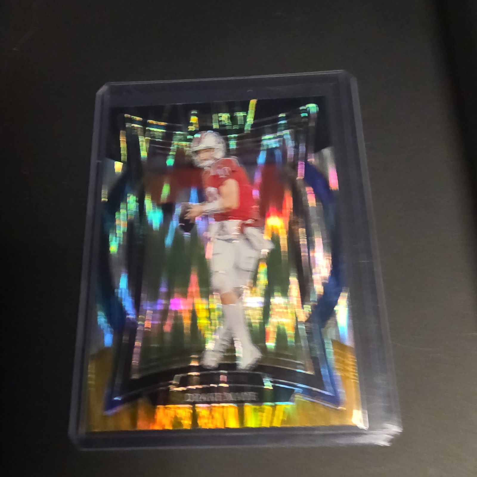 2024 Panini Select - Concourse Drake Maye #27 Black & Gold Shock Prizm (RC)