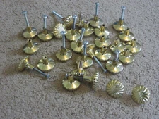 Lot of 29 heavy patterned golden cupboard door / drawer knobs