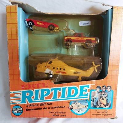mes-99990	Ertl 1079 Riptide Gift Set sehr guter Zustand,