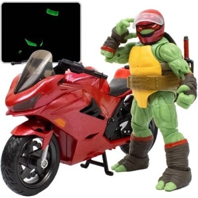 TMNT BST AXN IDW Raphael Actionfigur mit metallic Süßigkeitenmantel GITD Sport Bike
