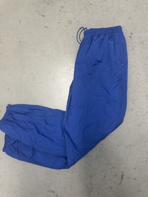 nike track pants zip leg
