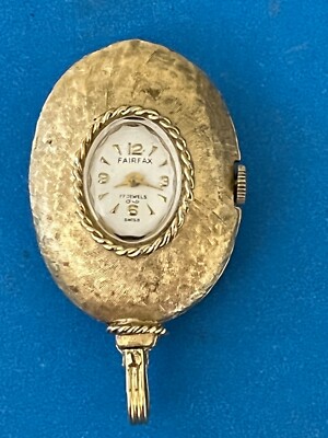 Vintage Fairfax Swiss Pendant 17 Jewels Watch gold tone w jade back Fairfax] Acquired today at an antique store. What can you  main image 4