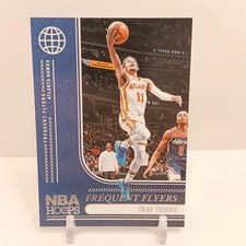2024-25 Panini NBA Hoops Basketball Trae Young #12 NM- Frequent Flyers