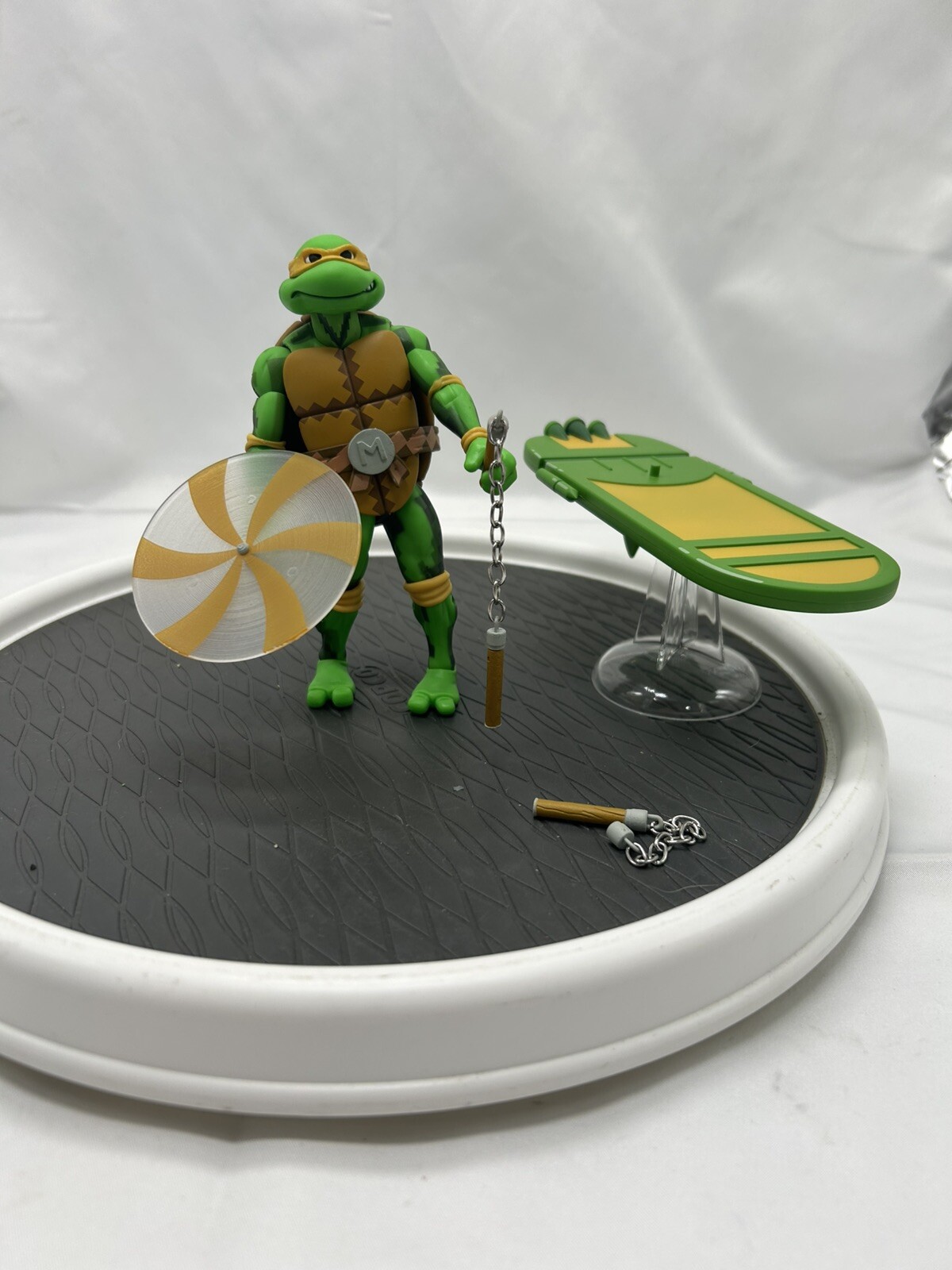 NECA TMNT Turtles in Time Michelangelo 7-inch action figure with accessories