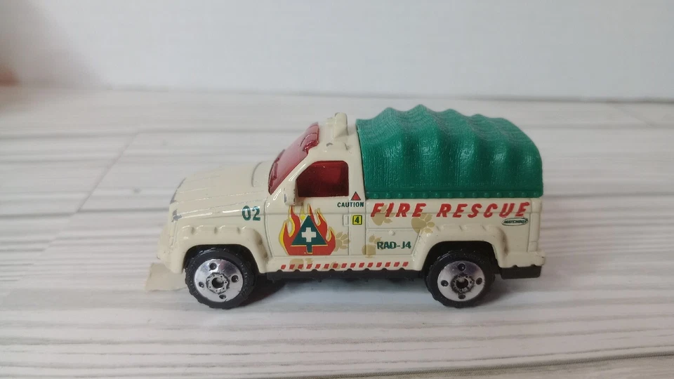 2000 MATCHBOX JEEP TROOP CARRIER JEEP FIRE RESCUE - Image 2 of 4