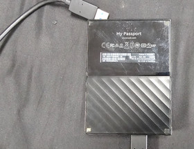 Microsoft Xbox One X with 1 controller, 4TB External Hard Drive, & 9 Games