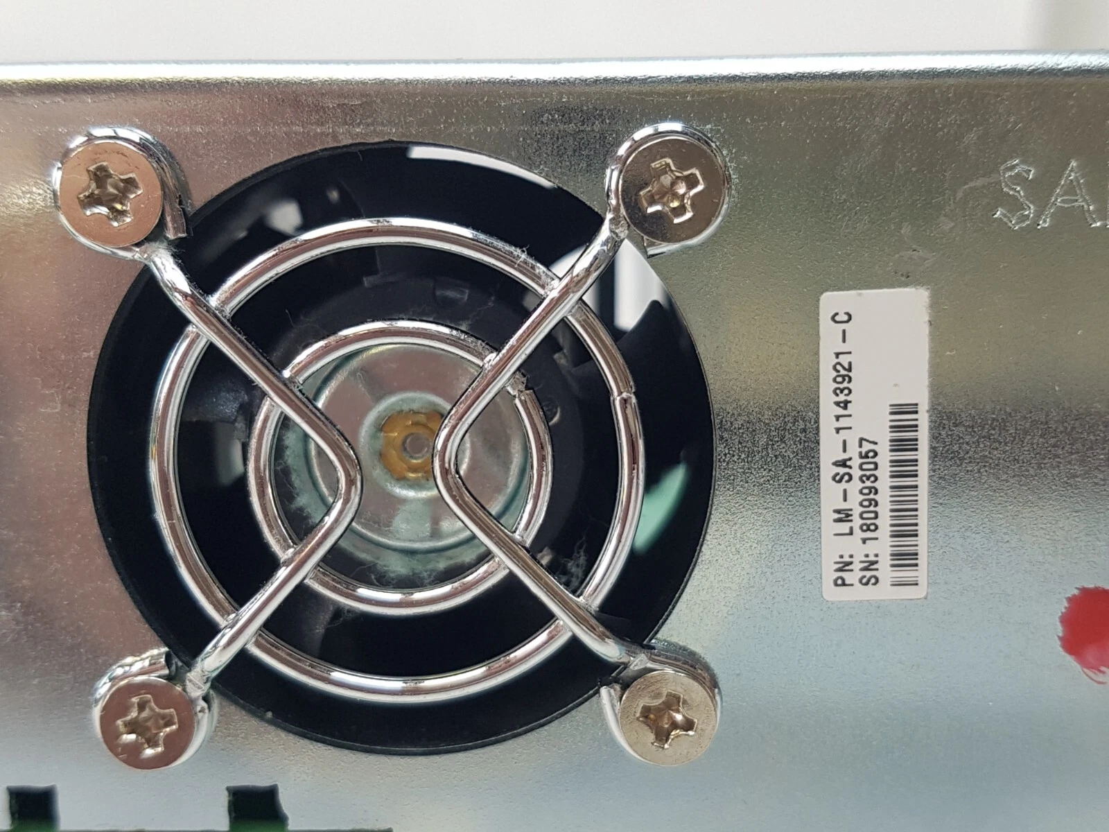 Fan guard and LM-SA-1143921-C label on the Lumenis Safety Module front plate