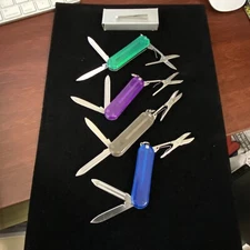 2.5” closed style multi purpose folding knife NEW in box/bag translucent