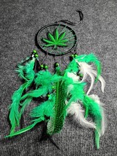 Dream Catcher Decorated with Dangling Feathers and A Leaf Design