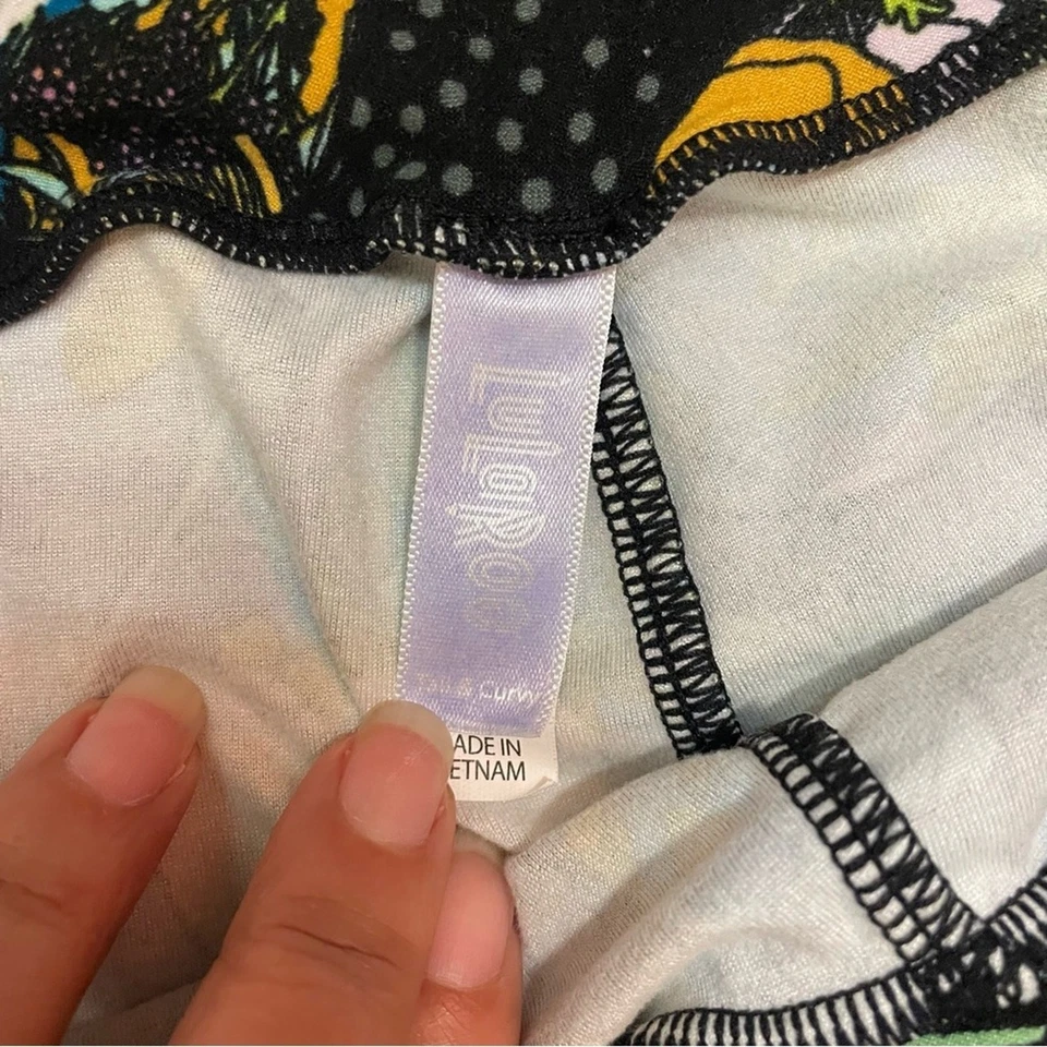 Leggings altos y curvilíneos LuLaRoe Disney Minnie Mouse estampado tropical verde y negro Foto 3 de 4