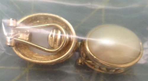 Gold and White Colored Pair Clip-on Earrings Oval Design 1in Length 0.5in Width - Picture 1 of 3