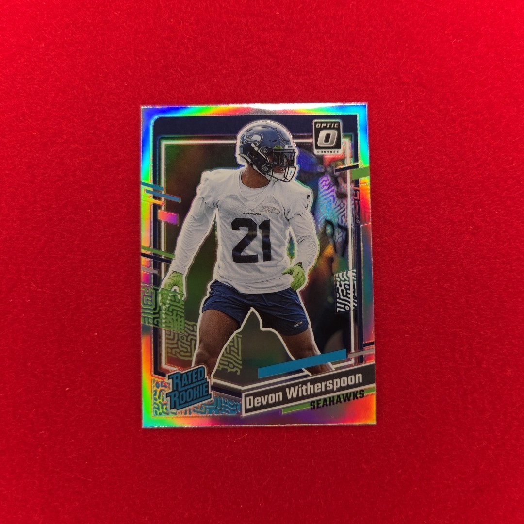 2023 Donruss Rated Rookie Devon Witherspoon #389 Optic Preview Holo Seahawks SSP