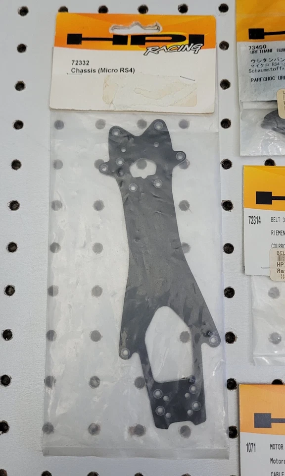 HPI Racing ~ Micro RS4 ~ 4 Item Parts Lot ~ Chassis, Belt, Bumpers, Plug NIP NOS - Image 2 of 4