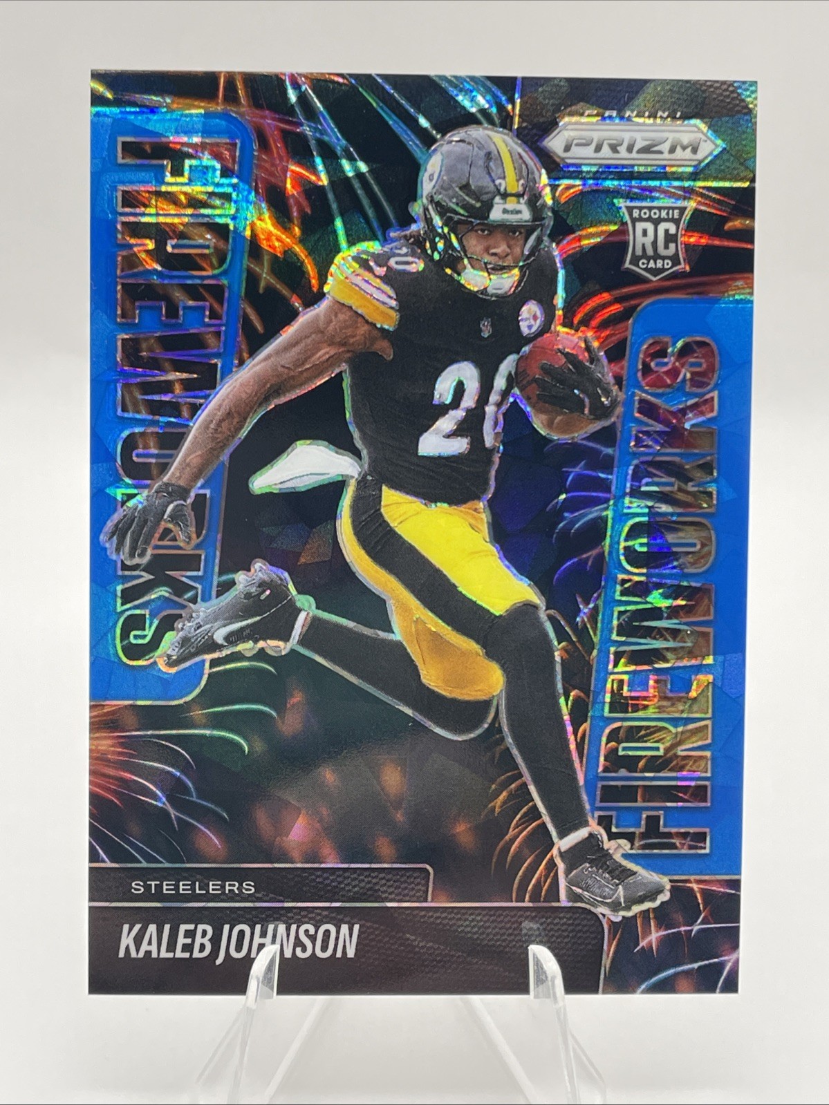 2025 Panini Prizm - Fireworks Kaleb Johnson (RC) Blue Cracked Ice 99/99 Bookend
