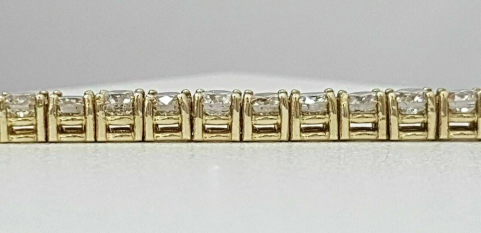 Brazalete de tenis para mujer de diamantes VVS1/D de corte redondo de 9 quilates acabado en oro amarillo de 14 quilates Foto 2 de 4