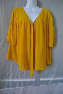 camisas color mostaza para mujer