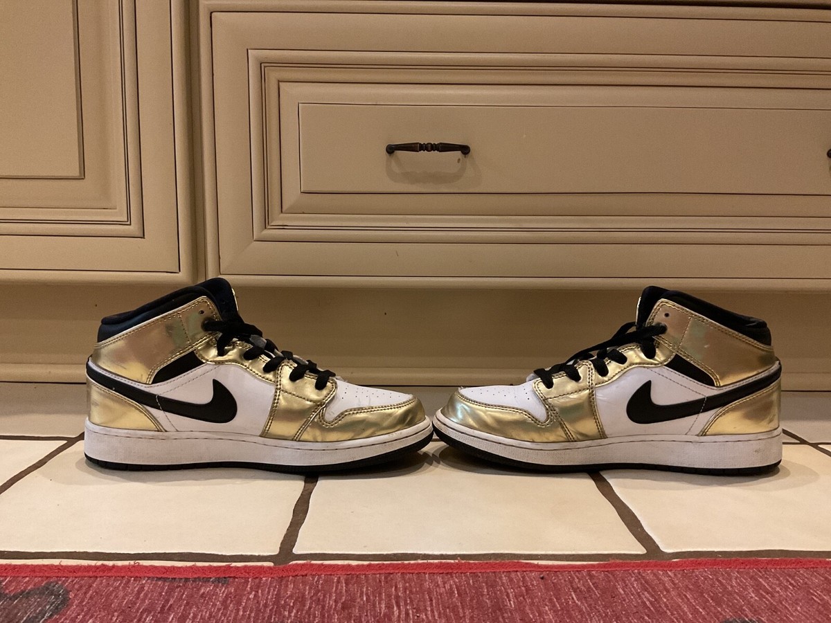 Black, white, and gold Nike Air Size youth, womens,  mens