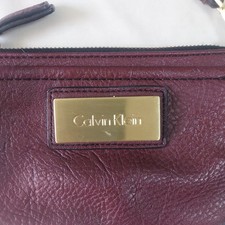 Borsa Calvin Klein bordeaux ciottoli ecopelle polso oro ferramenta