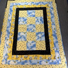 Baby Quilt 36x46. Bee Themed cozy flannel lining machine quilted and hand hemmed