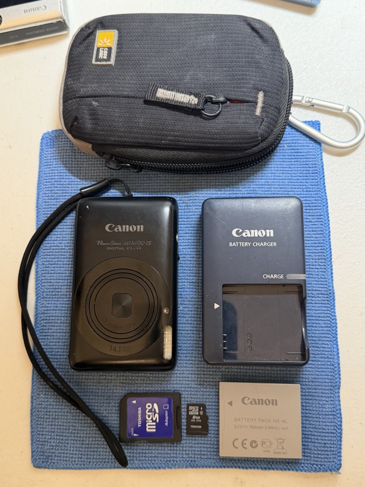 Canon Powershot SD1400 Is Digital Camera w/ sample photo, BUNDLE, Excellent!