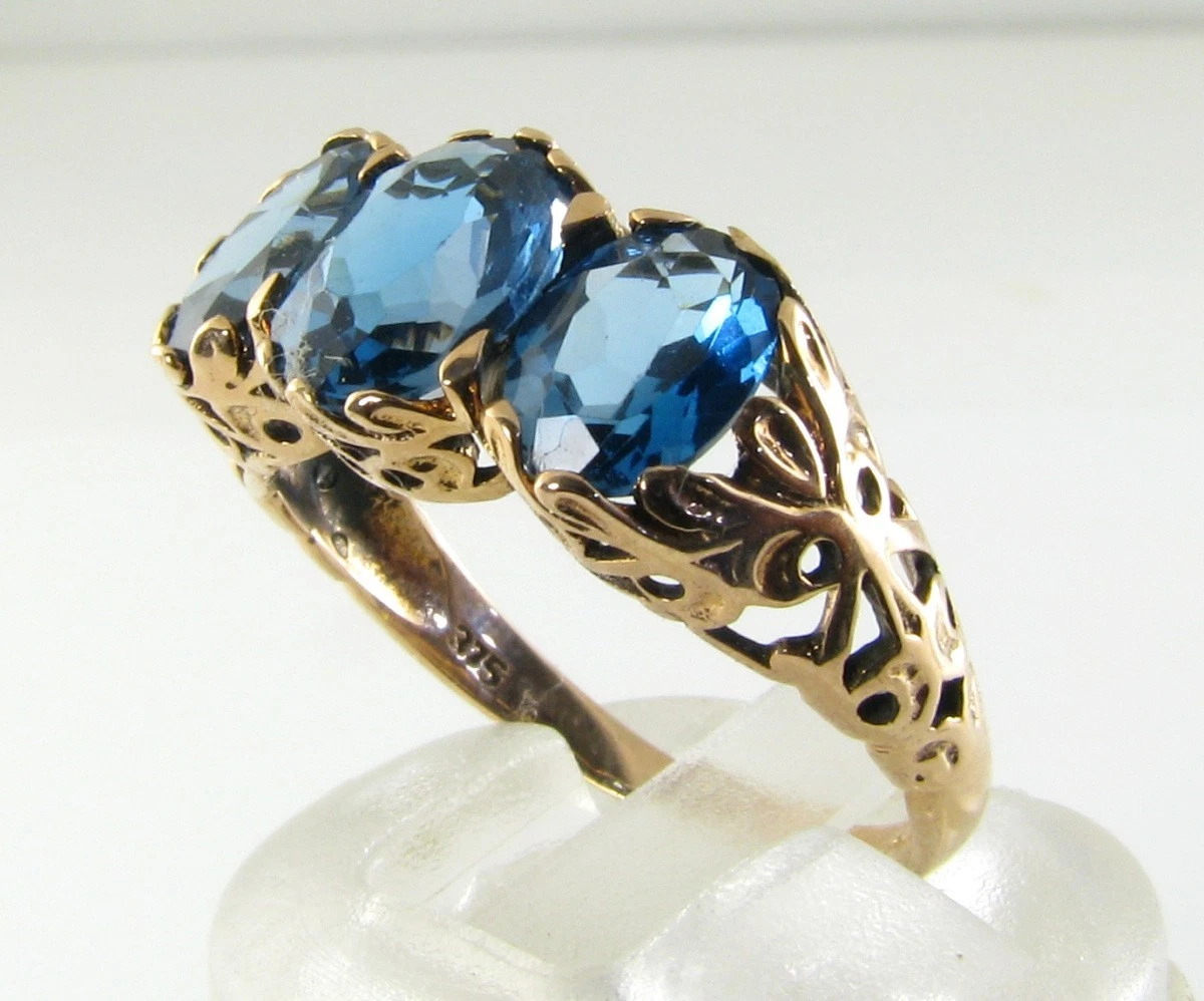 Anillo Art Deco 9ct Oro Rosa London Blue Topaz Trilogía, Talla O
