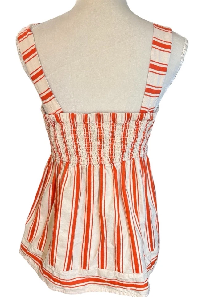 Top sin mangas a rayas naranja crema Cabi para mujer babydoll mediano con tiras Foto 3 de 4