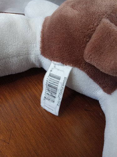 Liegender Welpe Hund Plüsch weiß braun Schlapptier Stofftier Spielzeug - Bild 2 von 6