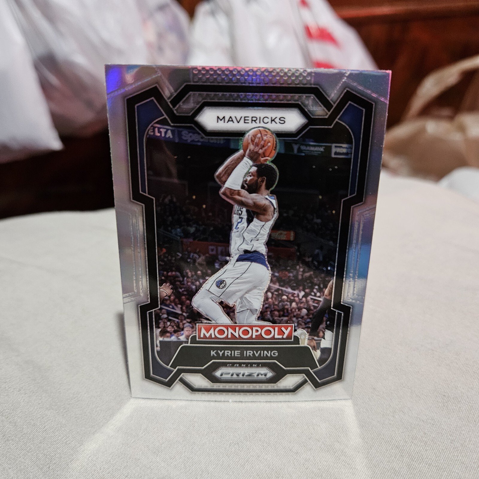 Kyrie Irving 2023-24 Prizm Basketball Monopoly Silver Prizms Card #23