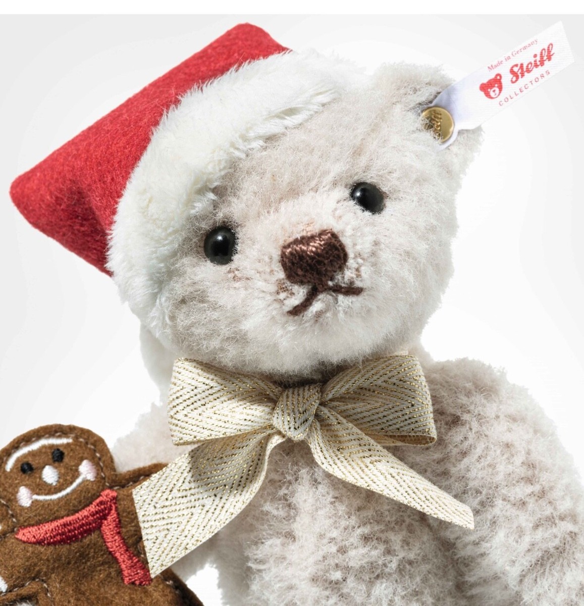Animal en peluche Steiff Ours Teddy miniature crépitant avec crécelle