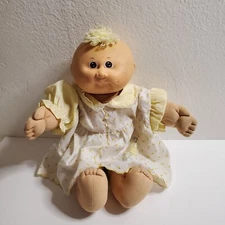 Vintage Cabbage Patch Kids Baby Girl Doll Yellow Tuft Hair Brown Eyes 1984