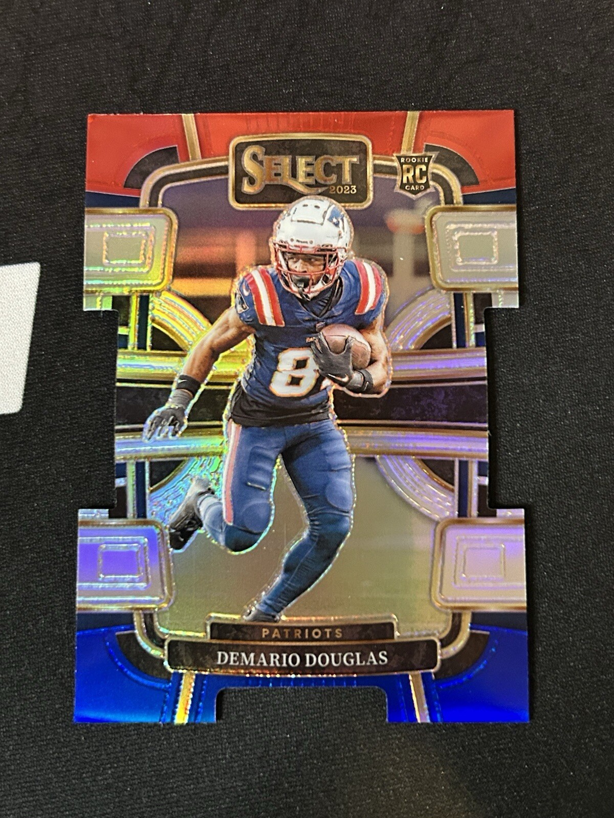 2023 Panini Select - Concourse Red & Blue Prizm Die-Cut #68 Demario Douglas (RC)