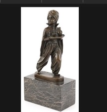 After Ferdinand Preiss, an Art Deco style bronze figure of an Arabic boy