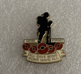‘Never Forget’ Poppy¹ Remembrance Enamel Badge
