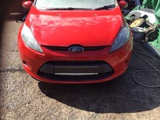 FORD FIESTA MK7 FRONT BUMPER IN COLORADO RED 2008-2012