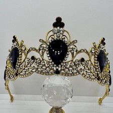 Baroque style crown with purple rhinestones