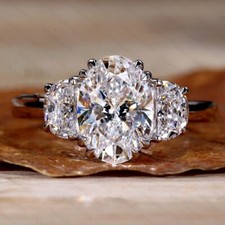 3.26Ctw Oval Cut Moissanite Three Stone Engagement Ring in 14k White Gold Plated