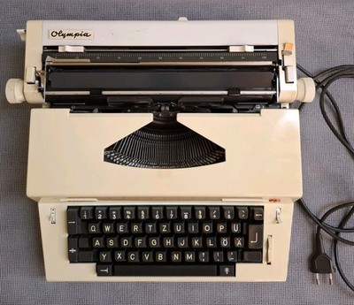 Vintage elektrische Schreibmaschine Olympia Report electric, 80er Jahre