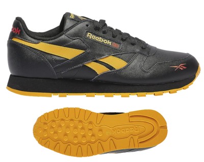 yellow and black reebok