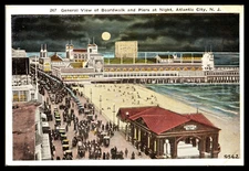 ATLANTIC CITY, General View Of Boardwalk & Piers at Night--Postcard G363