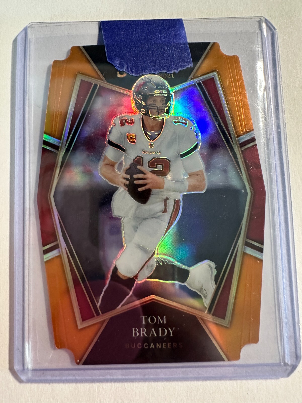 K122,261 - 2021 Select Prizm Orange Die Cut #101 Tom Brady #/249