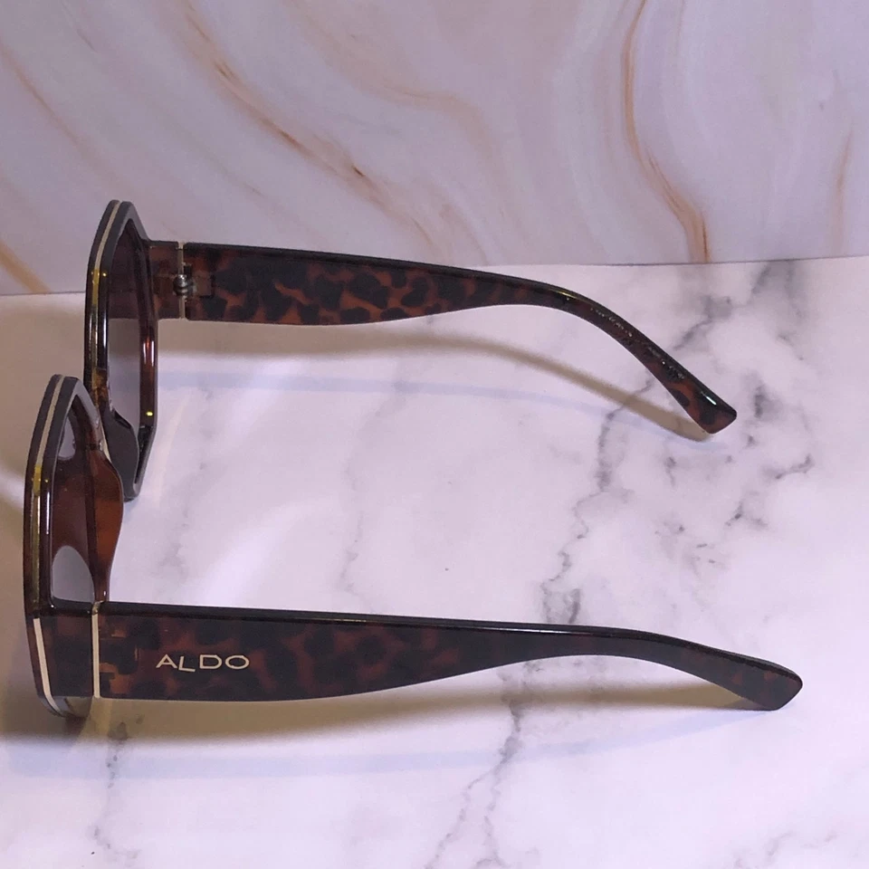Gafas de sol retro Aldo para mujer marrón tortuga marco hexagonal patrón de panal Foto 4 de 4