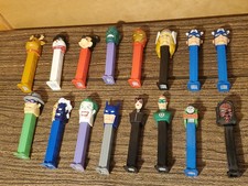 MIXED LOT OF 17 ASSORTED PEZ CANDY DISPENSERS PRE-OWNED