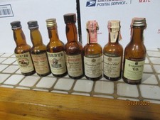 7 botellas de whisky miniatura estampadas vacías reales del estado: lee a continuación